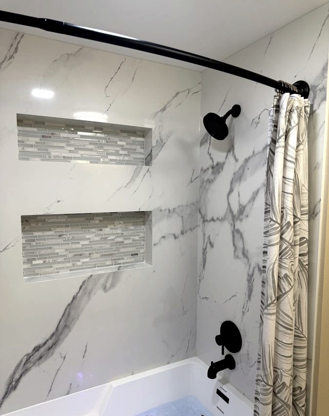 Tub & marble surround, Marble slab deck · mosaic niches